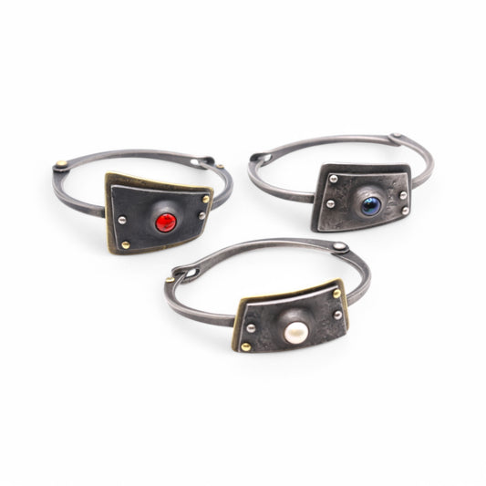 Hand-forged Bracelet with a clasp and natural stone